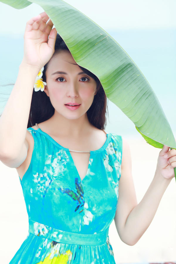 ��ͯ��ɳ̲д���ع� ױ������¶����Ц�� 